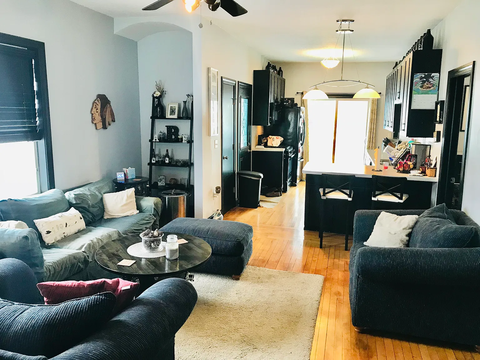 Living room looking toward kitchen at back of house. Open concept