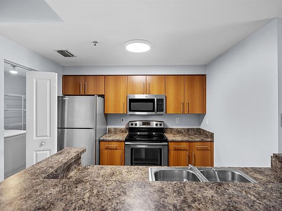 4th image of 5880 W Sample Road #307