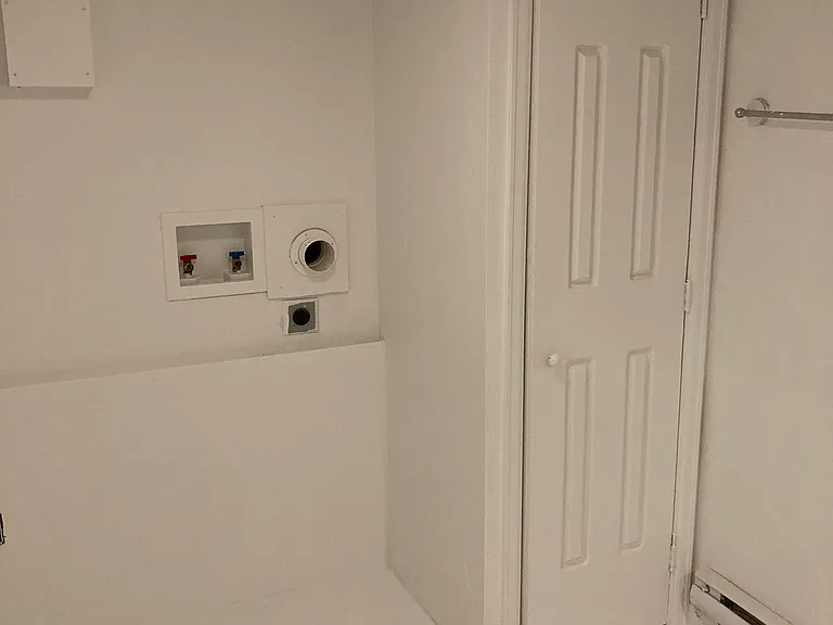 Washer and Dryer Hookups. Stack-able will definitely fit. I might be able to change a door out to make side by side fit but not positive.