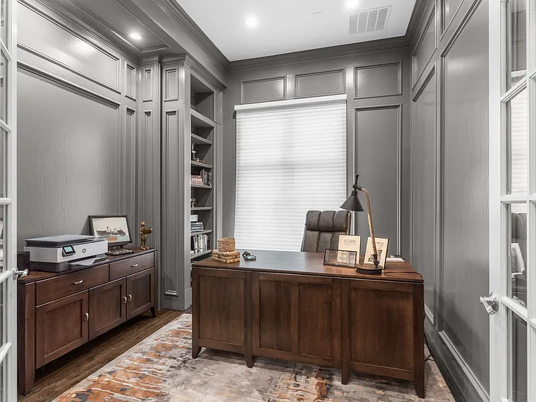 This private executive office provides the perfect space for remote work complete with a printer.