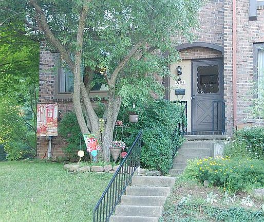 Front view of the unit. Tree pictured was recently removed.