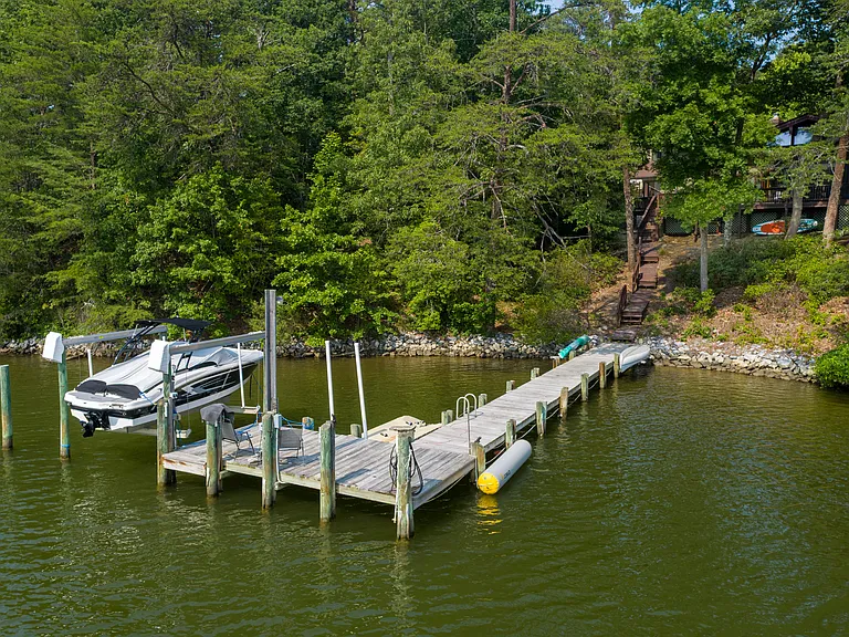 Dock with lift and jet ski dock.