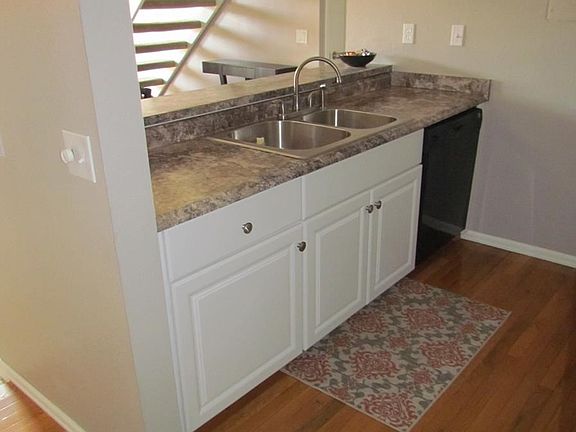 Updated kitchen opens to living room
