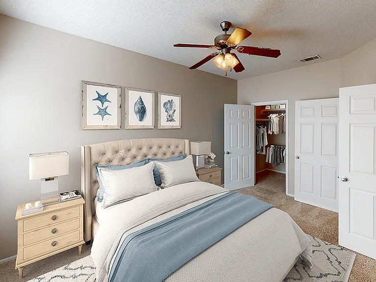 Bedroom with Overhead Fan and Large Closet
