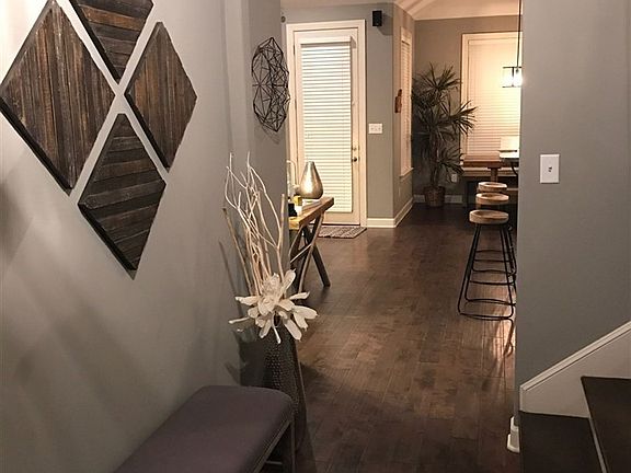 Beautiful hardwood floors throughout the first level of home.