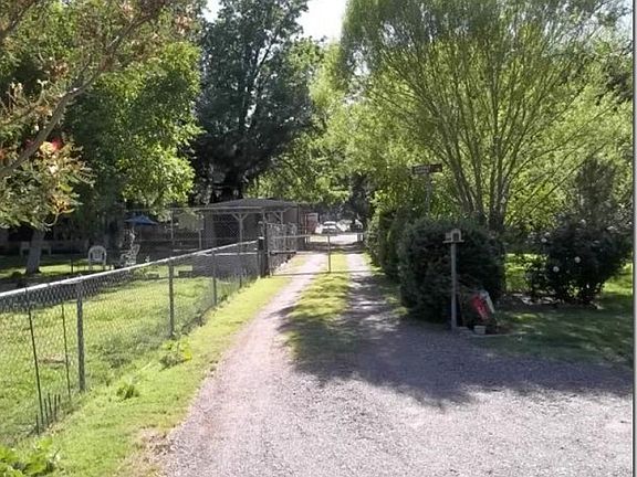 Parcel on left of chain link