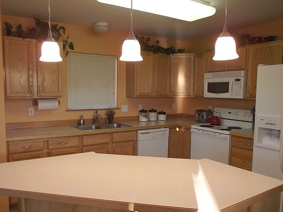 Kitchen with island and breakfast bar