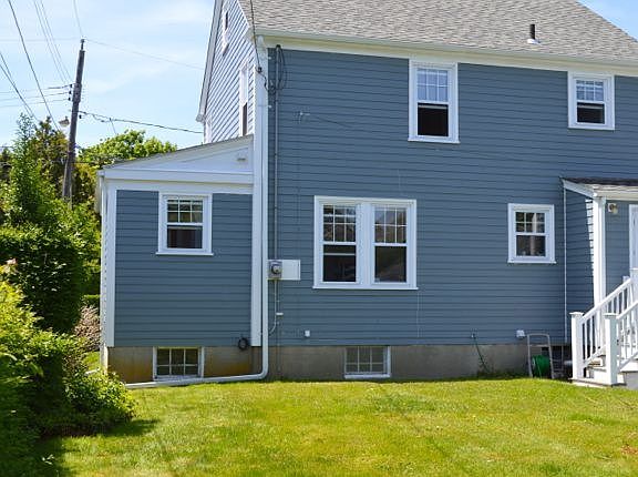 Large private backyard for dogs and barbeques