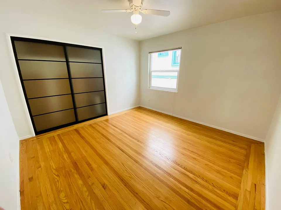 Bedroom 1 (w/ ceiling fan and large closet)