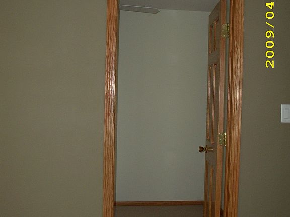 Door leading to bedroom off of the family room