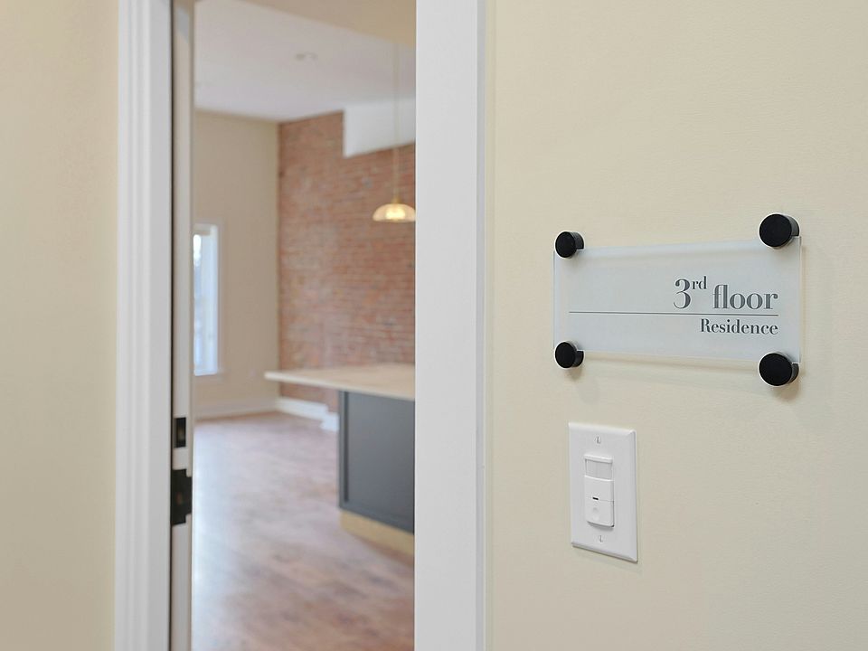As you enter, you are greeted with a light-filled living space.