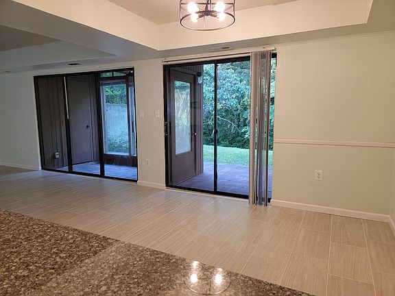Dining area in front of glass sliding doors