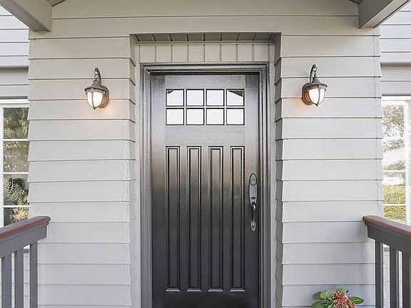 Exterior doors have been upgraded to solid-wood and accentuate the charming character of this home.