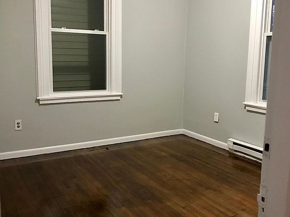 Bedroom 2, with beautifully refinished hardwood floors