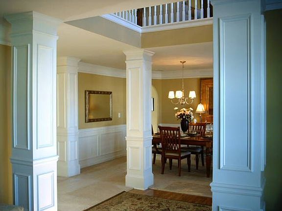 THE DECORATED MODEL-Majestic columns w/Elegant moulding is standard.
