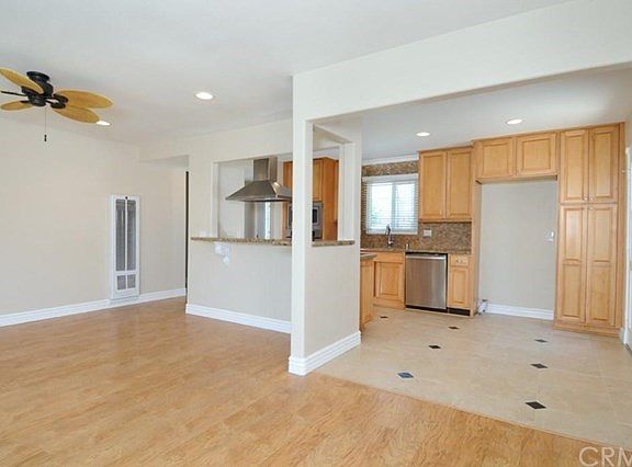 Entrance to spacious kitchen from living area