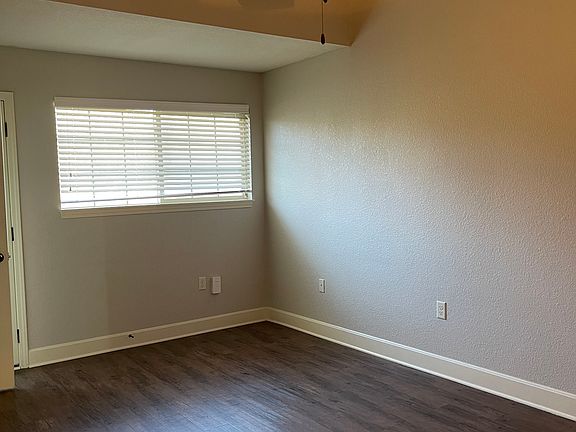 Bedroom downstairs, access to the patio