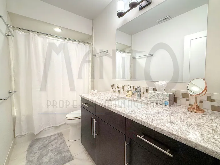 947 E 32nd Ave — Photo 20
