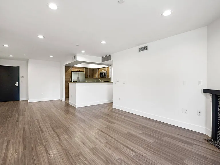 Open-Concept Kitchen, Dining, and Living Room Areas