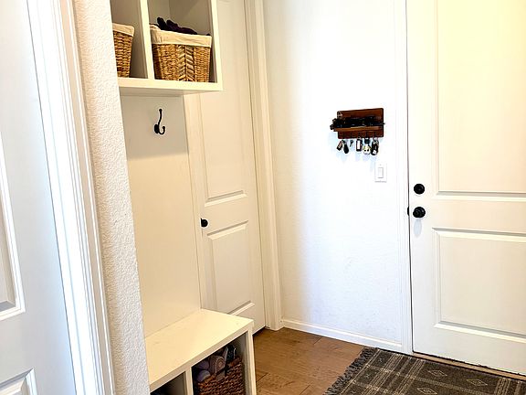 Hallway with Mud Room Cabinet and Shelves.