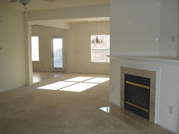 The greatroom also features a gas log fireplace and TV niche