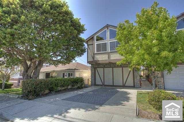 Welcome to your hilltop home. Notice the single story home next door