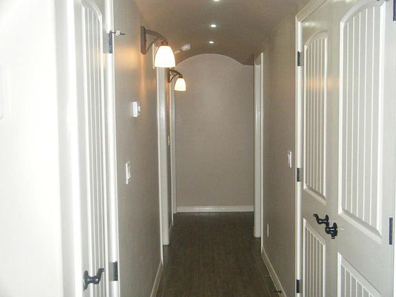 Hallway to include laundry room behind the double doors