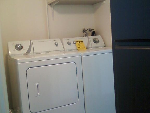 Laundry area comes with adjustable drying rack