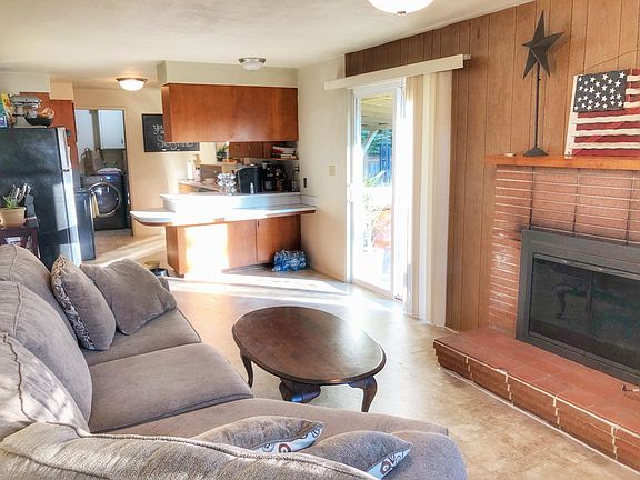 Fireplace, kitchen and laundry