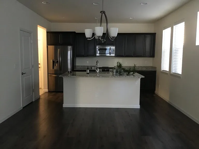 Lots of light, windows along dining, kitchen