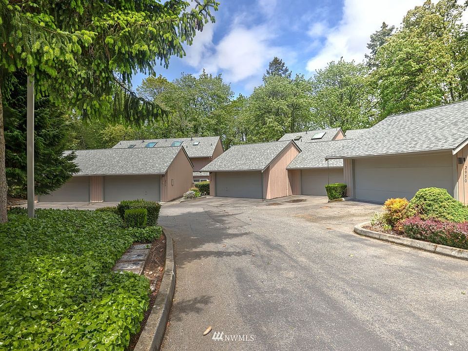 The beautiful solid hardwood door is open, please come in.  A coat closet to the left just inside the front door.  All the neutral ceramic tile you see is in excellent condition.