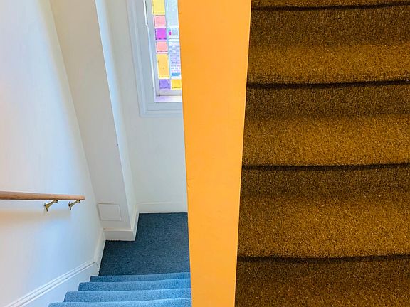 Stairwell Stain Glass to Apartment