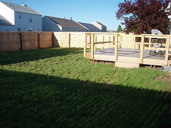 Backyard with new deck and fence