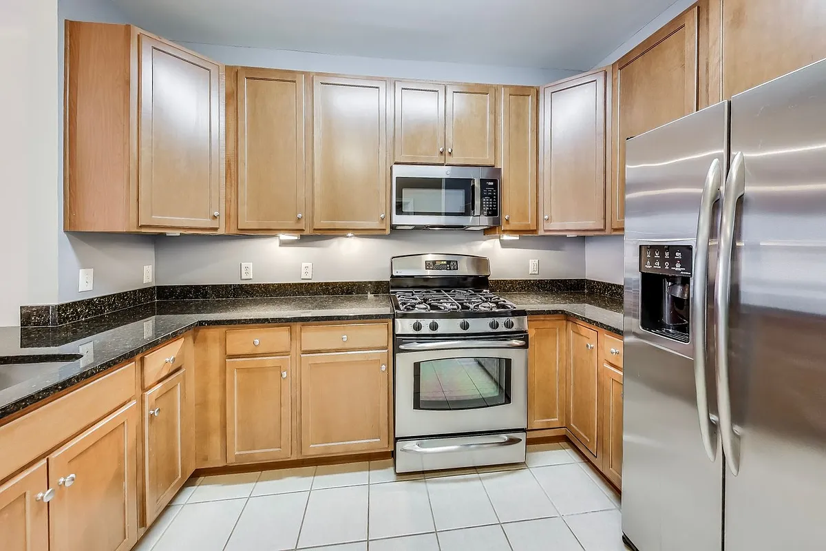 Building Photo - 8045 Newell St #108