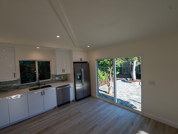 Kitchen area opening to outdoor space