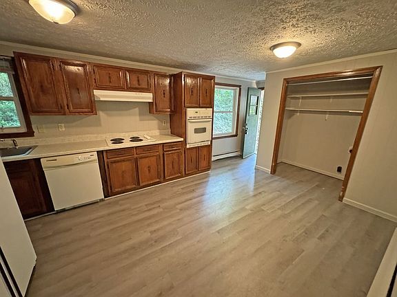 Side Entrance from Carport to Kitchen, Utility Closet for Your Washer and Dryer in Convenient Location.