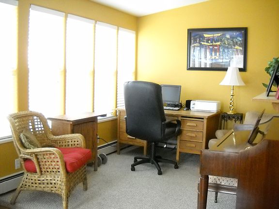 Sunroom with wall of windows