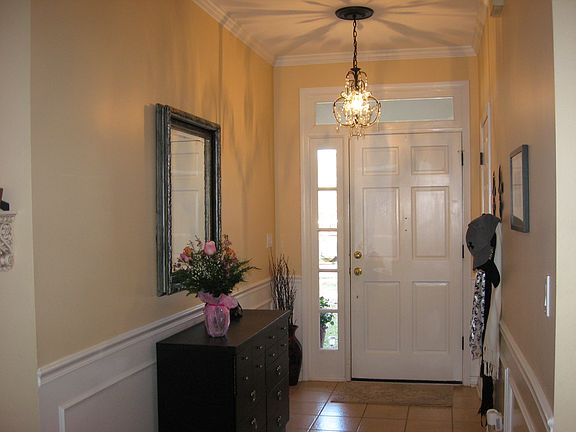 Welcoming Foyer with coat closet