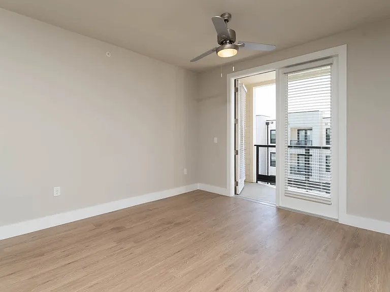 Living Room with Balcony and Hard Surface Flooring
