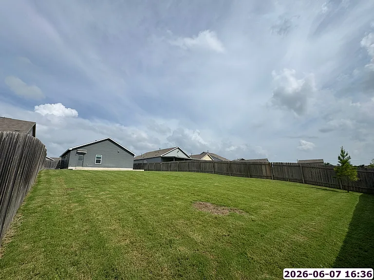 Backyard view of house