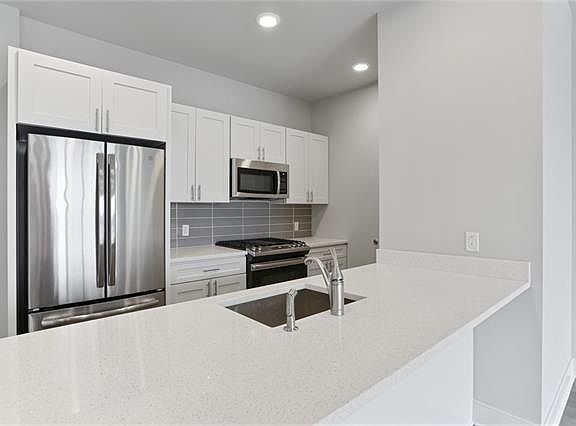 Image showcasing Elegant Warehouse District Penthouse | New Orleans, Louisiana