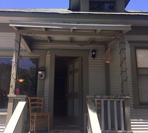 Front Porch, leading into living room. Looks out onto quiet tree lined street.
