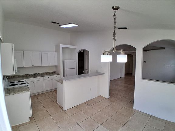 4th image of 2835 Palm Isle Way