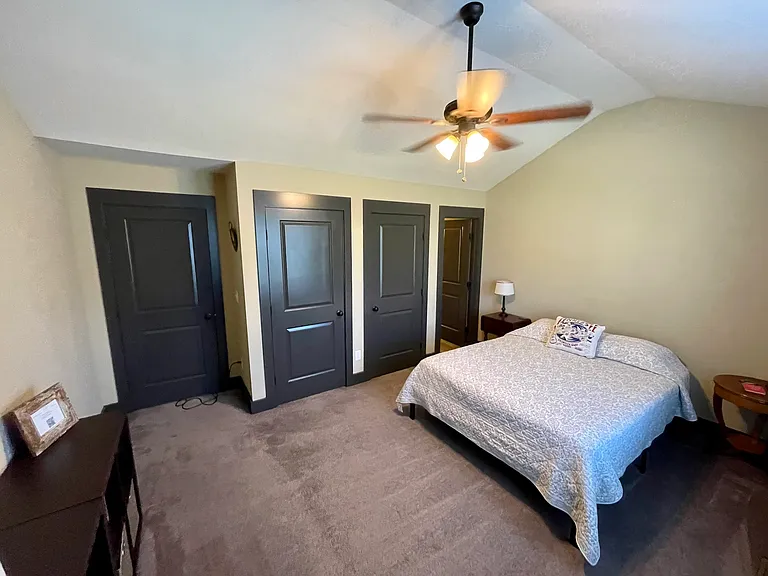 Additional bedroom with queen size bed and two closets