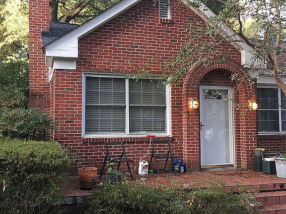 Porch w deck and archway