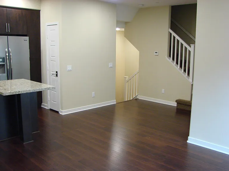 Living room space attached to kitchen area
