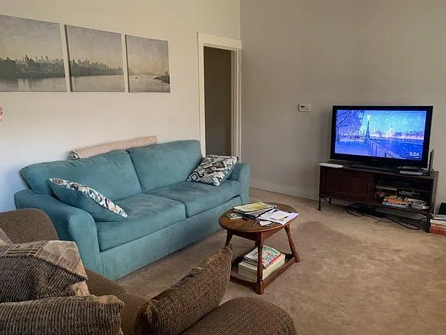 Living room when it had carpeting. Great size - 12x15