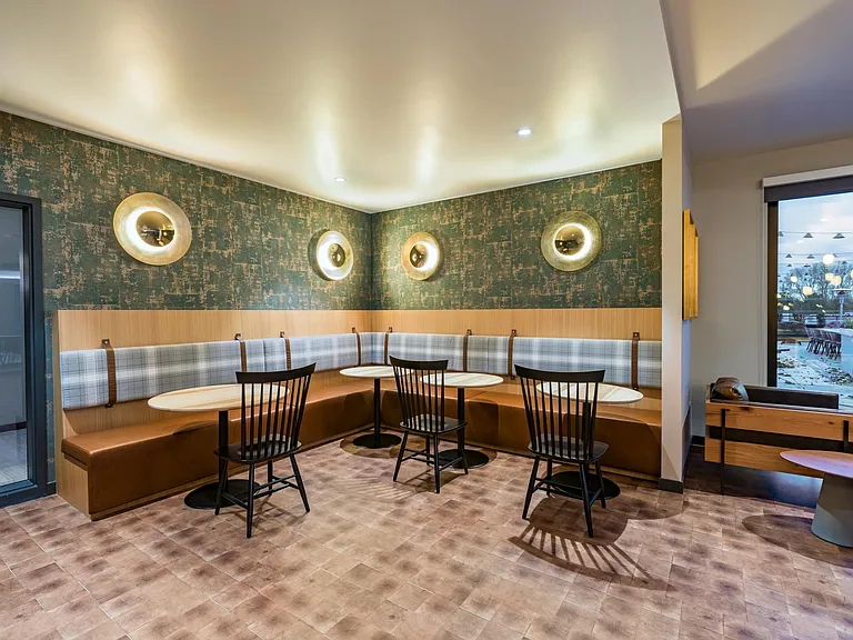 Relax and entertain in the lounge with a demo kitchen and plenty of room to gather.
