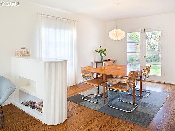 Example of eating area in main living room with built in bookshelf.