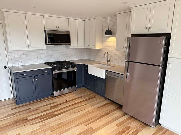 Fully updated kitchen with new appliances and farm sink